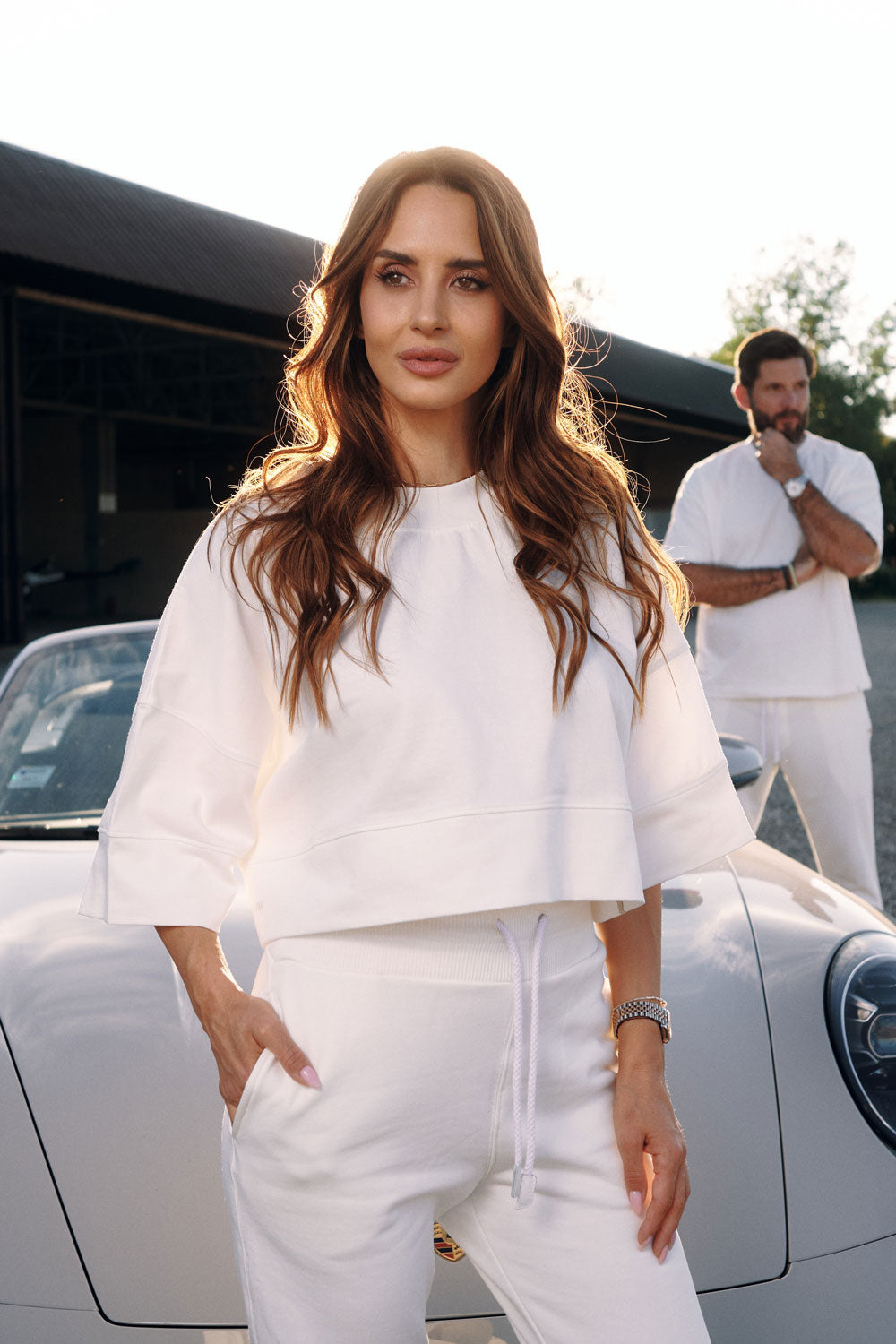 High-waisted cotton trousers with zippered cuffs