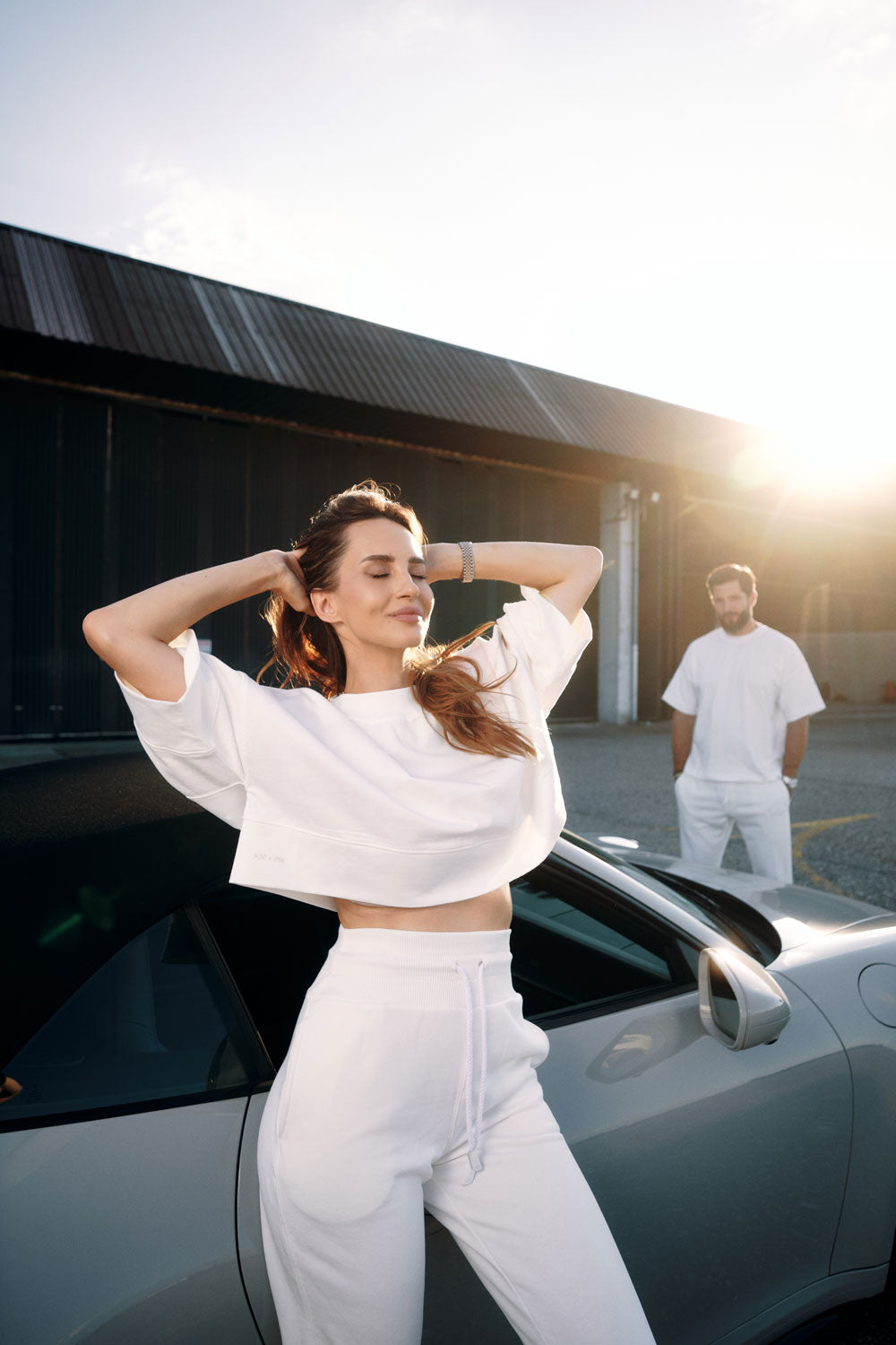 High-waisted cotton trousers with zippered cuffs