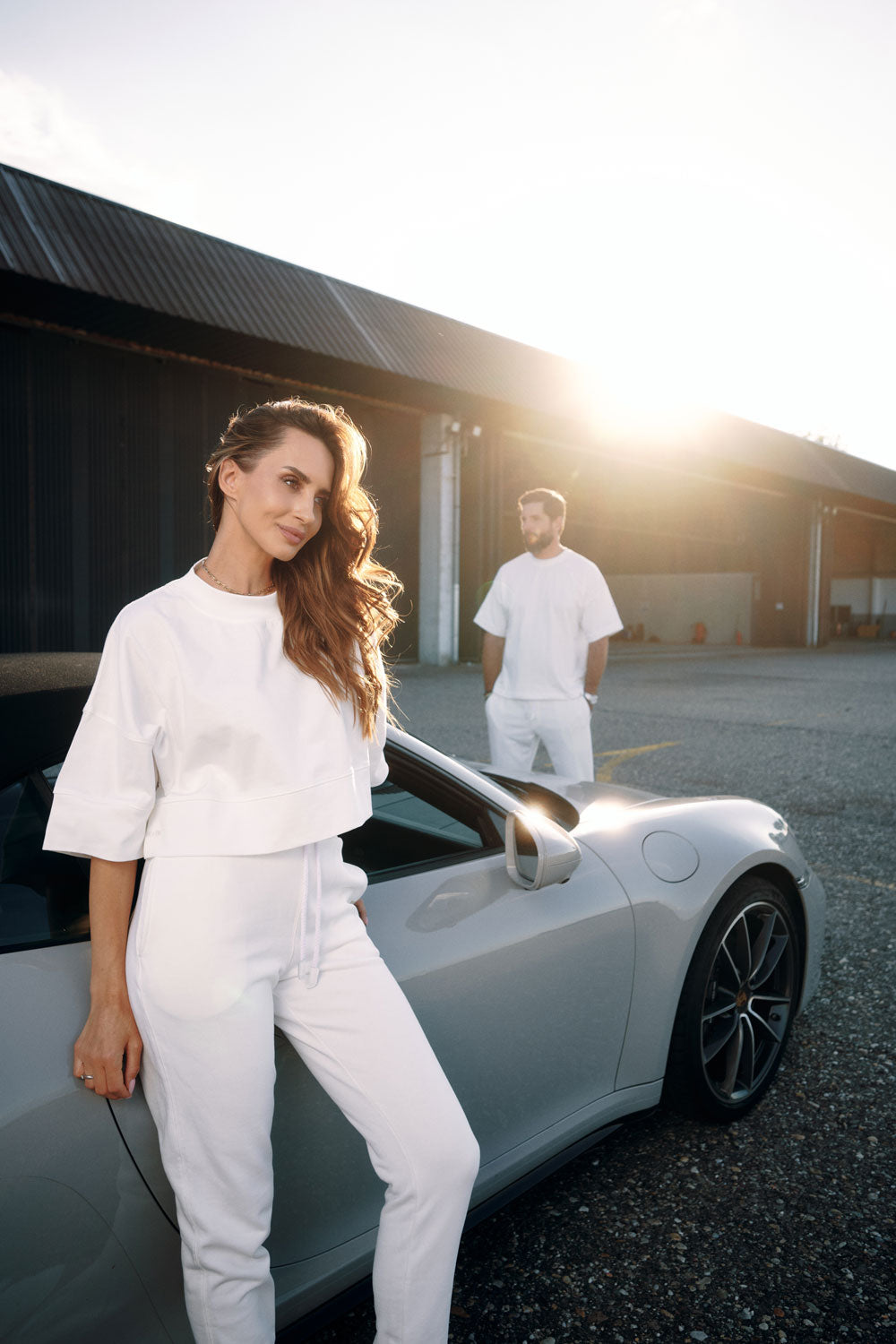 High-waisted cotton trousers with zippered cuffs