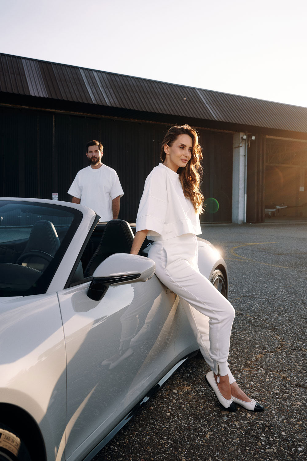 High-waisted cotton trousers with zippered cuffs