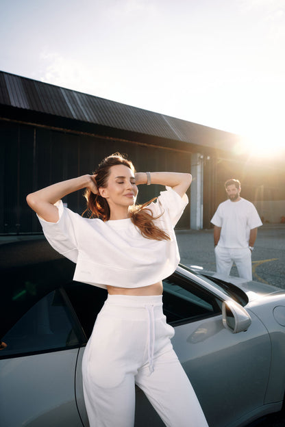 High-waisted cotton trousers with zippered cuffs